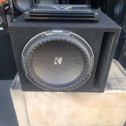 UNA BOCINA KICKER Y AMPLIFIER 