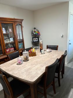 Marble top table with cherry sturdy legs.