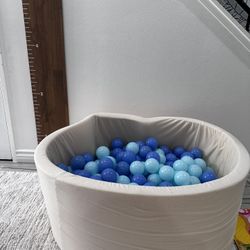 Crate And Barrel kids - Baby and toddler natural pop-up ball pit with blue mix balls 