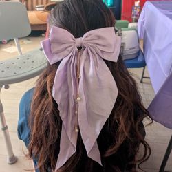 Large Bow With Dangling Charms