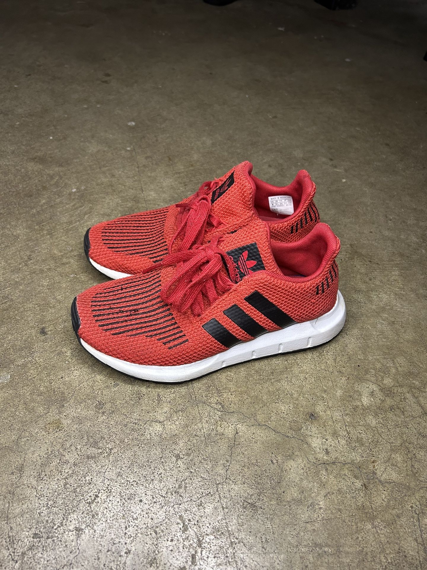 Red Adidas shoes