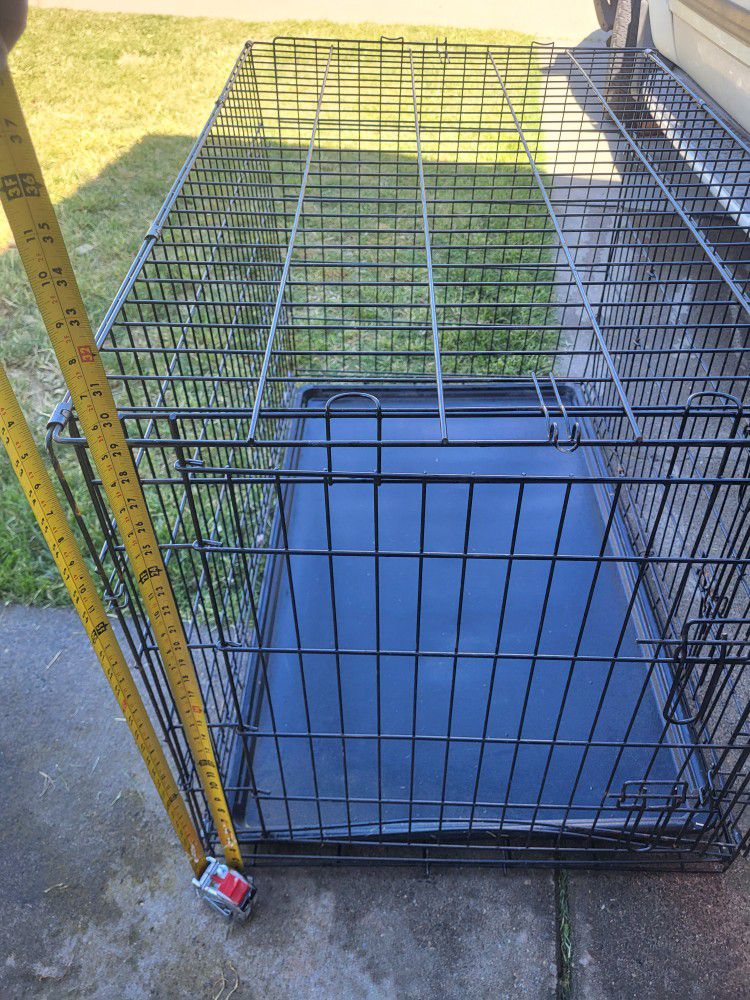 Collapsible Metal Dog Crate.   26 W 30h 41 Long 