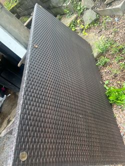 Wicker table with glass