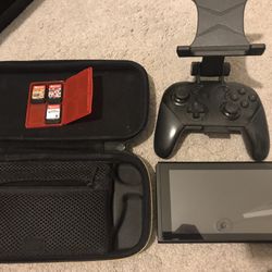 Nintendo Switch + 3 Games + Pro Controller