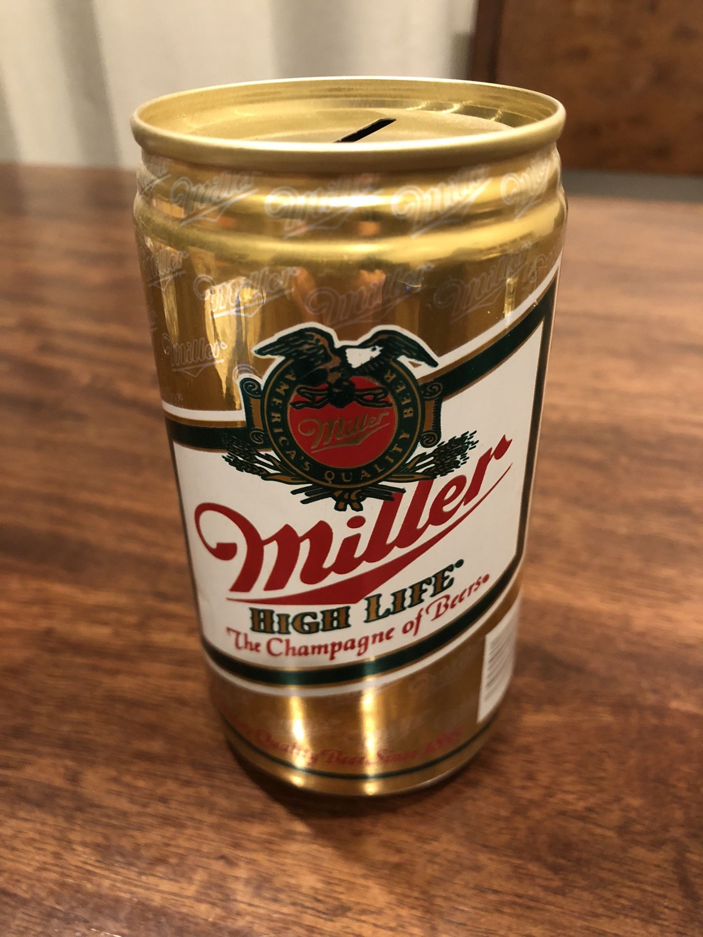   VINTAGE MILLER COIN CAN