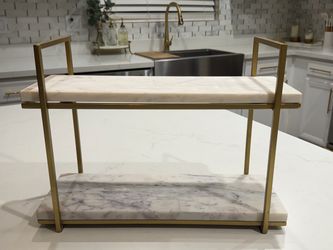 Gold and marble stand for decoration and more