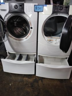 Kenmore front load washer and dryer set working perfectly with 4 months warranty