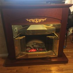Cherry Wood Fire Place With Remote Control Insert And Beveled Glass Doors