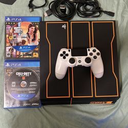 PS4 (playstation 4 call of duty black opps edition) with one controller all the cables including controller charger, 2 games GTA 5 and black opps 4