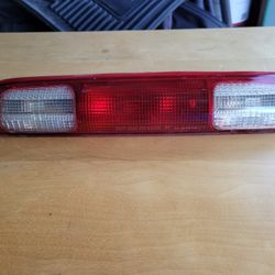 2006 SILVERADO 4 DR. REAR BRAKE LIGHT.