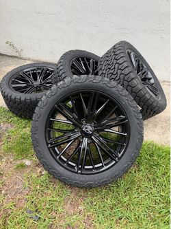 22” Inch Black 22" Wheels 33x12.50 Tires Chevy Tahoe Silverado
