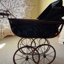 Antique Baby Stroller And Umbrella