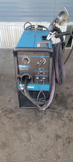 Millermatic miller Welder 210  with cord, gun, tanks