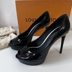 Louis Vuitton Peep-Toe Pumps.