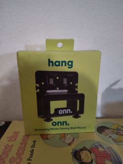 ONN. STREAMING MEDIA DEVICE WALL MOUNT