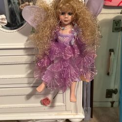 Beautiful!! Porcelain Angel/Fairy Doll that sits On A Swing !!!