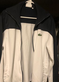 Lacoste zip jacket Small but I wear a men’s large and it fits
