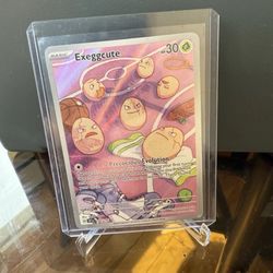 Exeggcute 192/191 Sv08: Surging Sparks Holo Pokémon