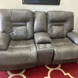 Gray leather dual recliner