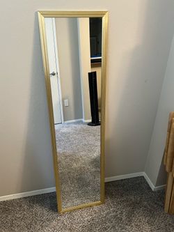 Gold colored mirror