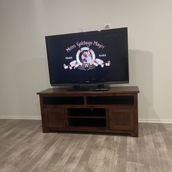 55” Sharp TV  And Cherry Wood Table