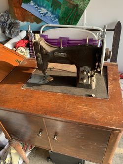 Antique Sewing Machine And Cabnet