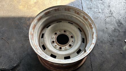 One beat up Chevy Or GMC 15x8 Inch 6 Lug rally wheel K5 K10 C10