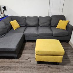 Gray Couch, Yellow Pillows & Ottoman