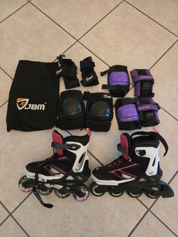 Adjustable Spitfire XT G rollerblades size 5-8 with pads