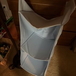 CLOSET HANGING HOLDER 11"w x 13"deep x 26"high; cross streets are Arapaho & Waterview 