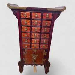 Asian Korean-style wooden apothecary herb cabinet (known as a yak-jang) featuring an 18-drawer upper section