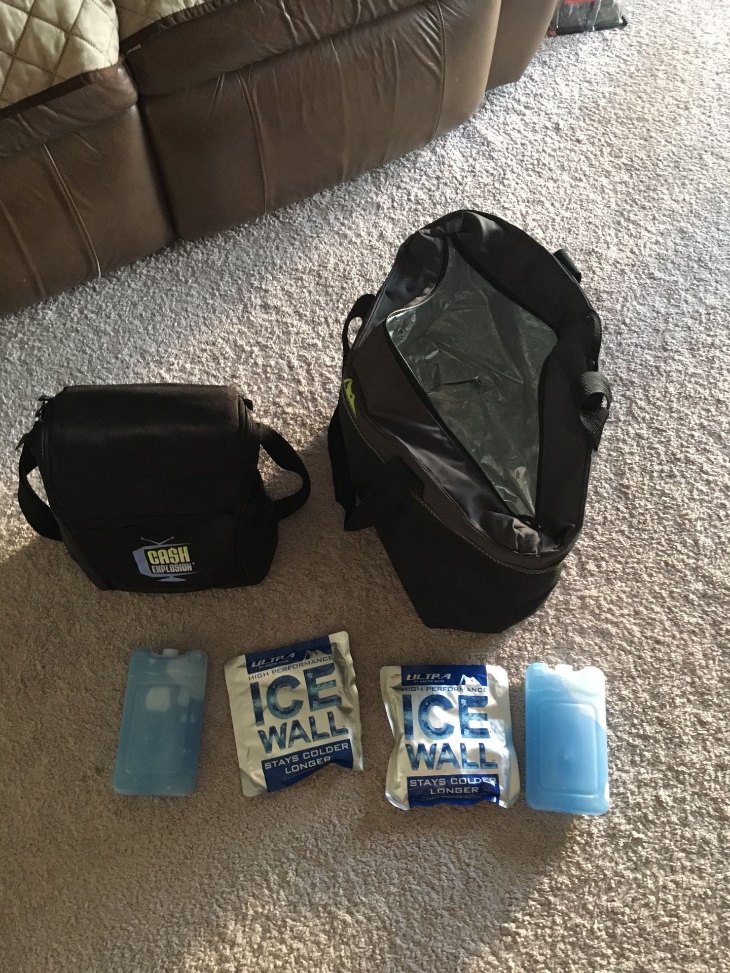 Cooler set. Contains the cooler tote, smaller cooler Bag, 4 ice packs. All in excellent condition.