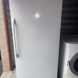 White GE Standing Freezer