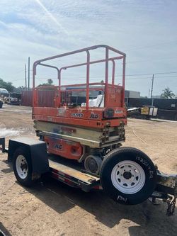 2007 JLG 3246ES ELECTRIC SCISSOR LIFT 32 FT PLATFORM HEIGHT &  7.000 LB CAPACITY
32 FT PLATFORM HEIGHT AND A 38 FT WORKING  HEIGHT