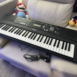 Yamaha EZ-220 Portable 61-Key Light-Up Electronic Keyboard