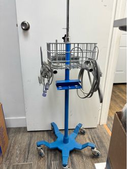 medical equipment stand with basket
