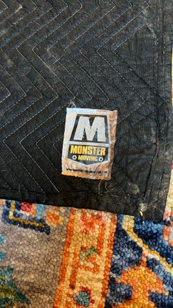 moving  blanket 51” x71” inches   some stains but washed