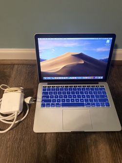 Macbook Pro 13" 2015 2.7 ghz i5 dual core, 8 gb ram,loaded with Adobe