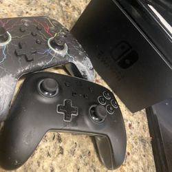 Used Nintendo switch two controllers in the TV dock