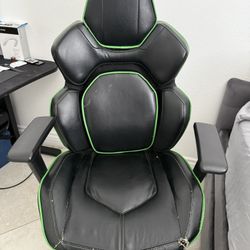 green and black gaming chair