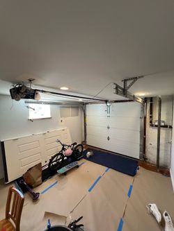 New garage door only used for a few years, no dents, perfect condition, all parts, make an offer