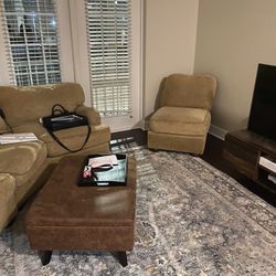 Large Couch, Ottoman, Tv Stand, Tv, Rug