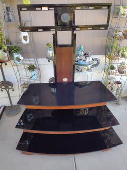 TV. STAND  TIN GLASS.  N. METAL. $30