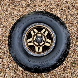 35 inch BF goodrich All-terrain tires and 17inch bronze rims. Fits Jeep Wrangler!