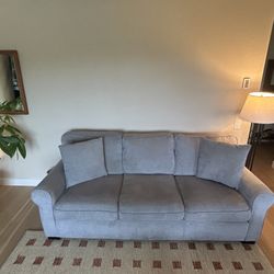 Grey Sofa 88” wide, 36” deep, 36 tall