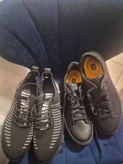 Two Pairs of Black Sneakers – CAT and Graphic