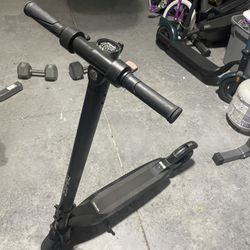 Electric Scooter    Missing Lens   Runs Well!   Charger Included 