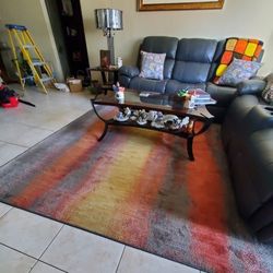 8' ×11' Decorative Carpet  . Very Nice. Smoke Free Home