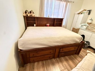 Full Bed Frame with storage cabinets.