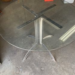 Custom built glass top iron table
